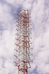 Radio or TV broadcast tower against blue sky background