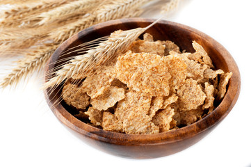 Muesli cereal in a wooden bowl