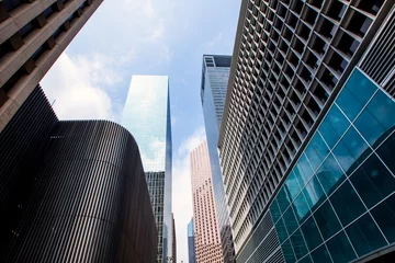 Fotobehang Houston downtown skyscrapers disctict blue sky mirror © lunamarina