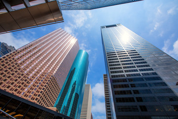 Fototapeta na wymiar Houston downtown skyscrapers disctict blue sky mirror