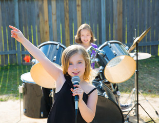 chidren singer girl singing playing live band in backyard