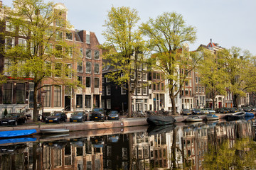 Fototapeta premium Amsterdam Houses by the Singel Canal
