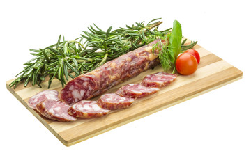 Salami with rosemary, basil and tomato