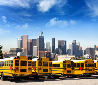 school bus in a row at LA skyline photo mount