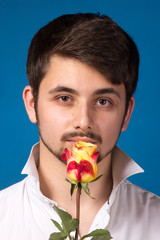 Man giving the red roses. Close up portrait.