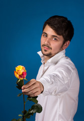 Man giving the red roses