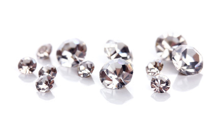 Beautiful shining crystals (diamonds), isolated on white