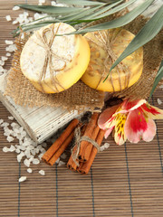 Hand-made soap and sea salt  on grey bamboo mat