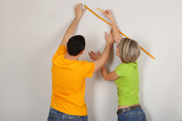 Young couple moving in new house