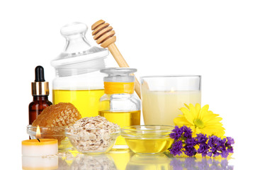 Fragrant honey spa with oils and honey isolated on white