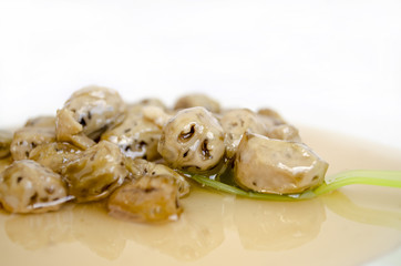 jam made of green nuts on white background