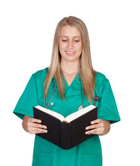 Atractive medical girl reading a book