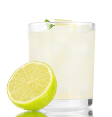 Lemonade in glass isolated on white