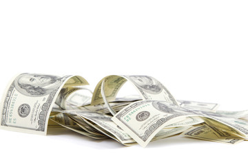 Heap of one hundred dollar bills U.S. on white background © trotzolga