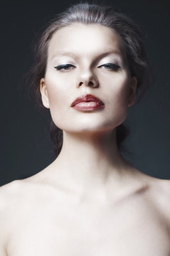 Studio portrait of beautiful woman face