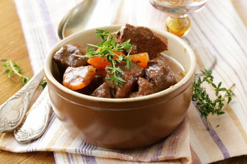 beef goulash (stew)  with vegetables and herbs - obrazy, fototapety, plakaty