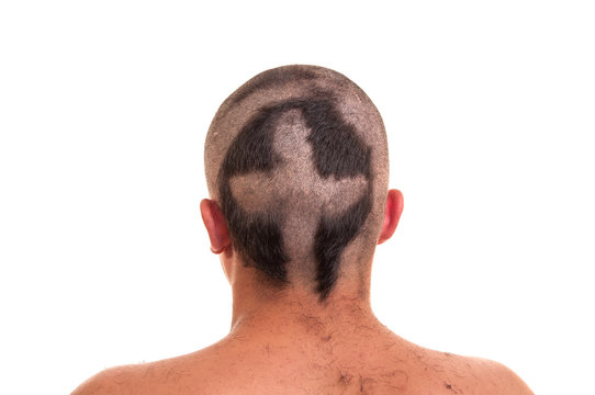 Closeup of the back of man head with funny haircut isolated on w
