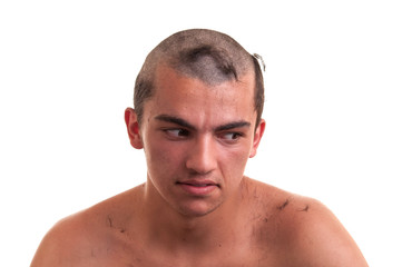 young man is disappointed that the barber by mistake wrong cut h