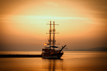 Ship silhouette at sunset