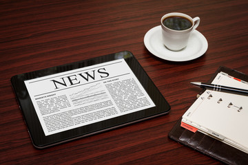 News on digital tablet.