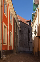 Fototapeta na wymiar Old Tallinn colorful street fragment