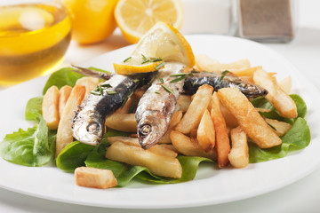Grilled sardine fish with french fries