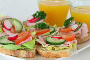 Sandwiches with ham and salad, close up