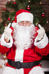 Santa Claus shows the middle finger