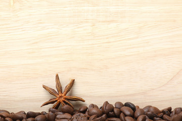 coffee beans on wooden surface background