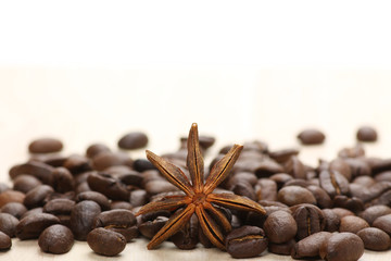 Coffee and star anise on white