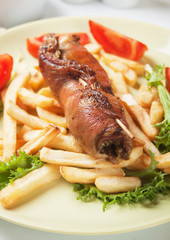 Rolled meat skewer with french fries