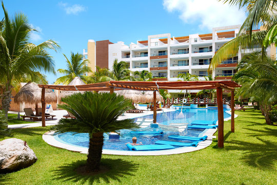 Swimming pool and hammock.