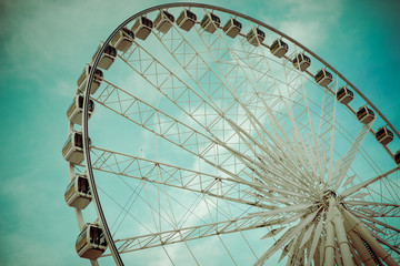Vintage Ferris Wheel Over Turquoise Sky