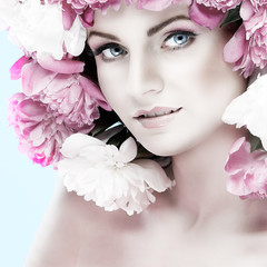 beautiful young girl with pink flowers