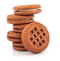 Stack of chocolate sandwich cookies with creme filing, food