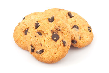 Pile of delicious cookies with chocolate chips on white