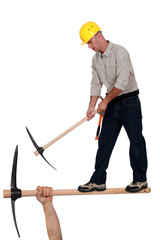 Worker with pick ax