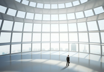 man standing in big hall