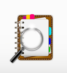 notepad with magnifying glass for you design