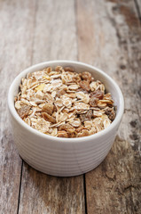muesli on wooden background