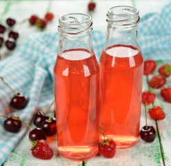 Fototapeta na wymiar The drink of strawberries and cherries