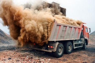 Dust explosion when loading red truck at the mine