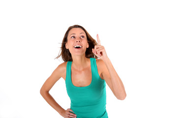 Fototapeta premium Brunette girl pointing finger up