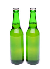 Two bottles of light ale on white background.