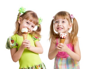 happy girls eating ice cream in studio isolated