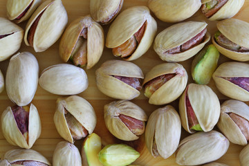 Pistachio nuts with and without shell, close up