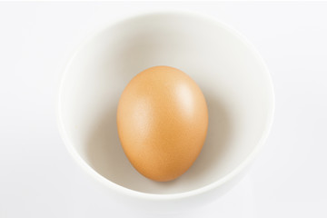 Boiled eggs in white bowl