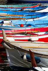 Fototapeta na wymiar Colourful rowboats used for fishing.