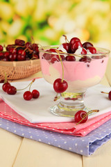 Delicious cherry dessert in glass vase