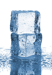 Pair of ice cubes with water drops